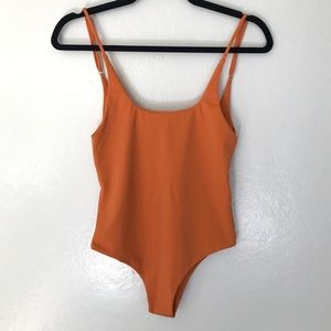 Orange one piece swimsuit